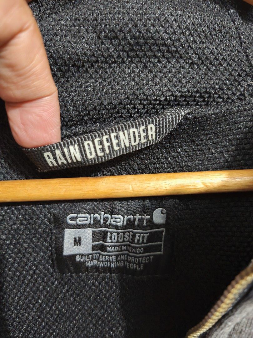 Carharrt rain defender jacket (Category: Coats, Jackets and Outerwear) located in San Mateo. Submitted by rgbuenaventura (Listing ID 1440230403, Image 2). Description: Original carharrt rain defender Size medium colour 8/10 Gray have some lints.