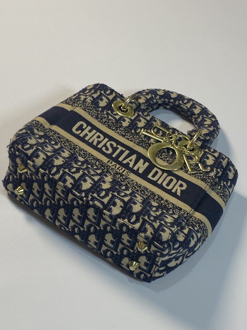 Christian Dior - Mini Lady D-Lite Mini Handbag (Category: Luxury Bags & Wallets) located in Makati City. Submitted by la_femme_by_bncks (Listing ID 1440356775, Image 3). Description: Just need to clean Hearing Offer This is a pre-loved/thrifted items and may show minor signs of issue due to its vintage nature. Kindly manage expectations. No refunds or exchanges will be accepted. 📍Pasay City DM for inquiries..