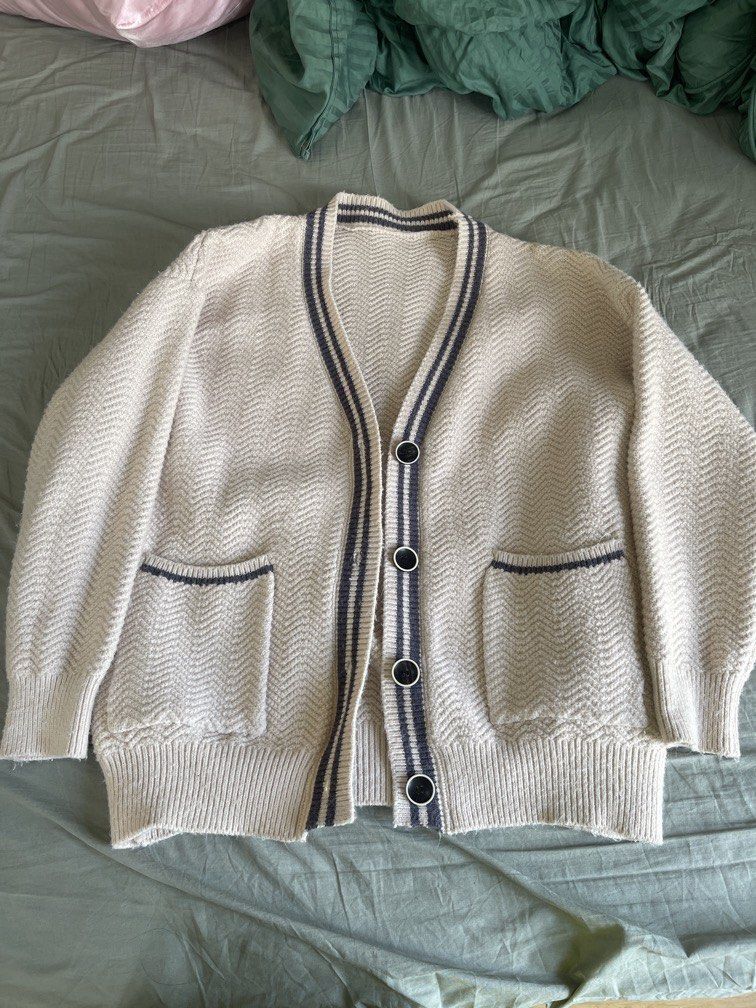 Cream knitted cardigan with pockets (Category: Coats, Jackets and Outerwear) located in Manila. Submitted by moolodica (Listing ID 1440220999, Image 1). Description: With navy trim and buttons Its quite thick and very comfy From HK Fits s-l RFS: raising funds to pay for my cat’s surgery.