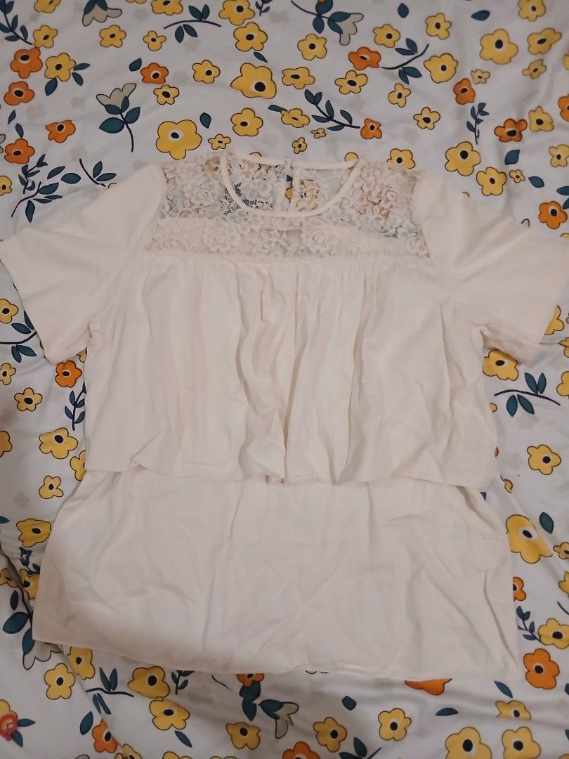 Cream Lace Neckline Peplum Top (Category: Blouses) located in Mandaluyong City. Submitted by bape_daying (Listing ID 1440327111, Image 2). Description: Cream top with short sleeves, lace neckline, gathered waist, and peplum hem. Button closure at back neck. Versatile for any occasion..