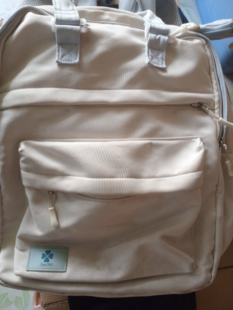 Cream with light blow accent with pouch and bagpack (Category: Backpacks) located in Manila. Submitted by padillahe35291 (Listing ID 1440271987, Image 1). Description: .