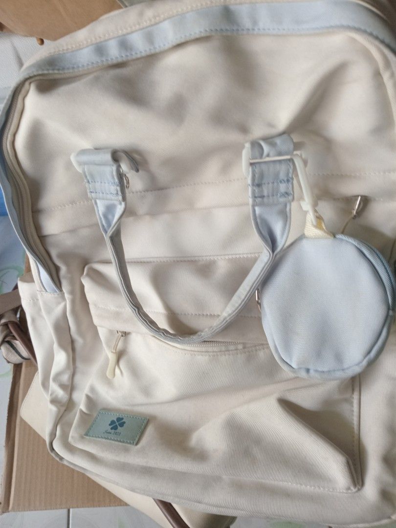 Cream with light blow accent with pouch and bagpack (Category: Backpacks) located in Manila. Submitted by padillahe35291 (Listing ID 1440271987, Image 3). Description: .