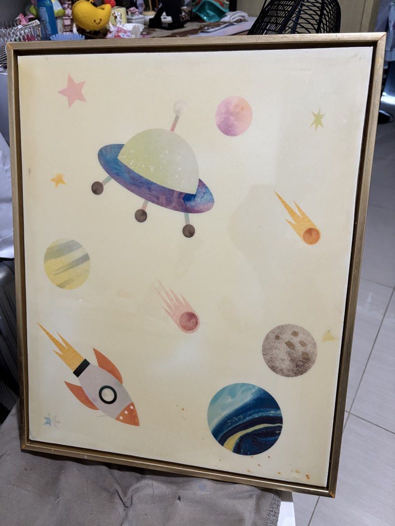 2pcs Cute Framed Wall Art - Space & Jungle Themes (Category: Frames & Pictures) located in Quezon City. Submitted by syjamie22 (Listing ID 1440278905, Image 1). Description: - Width 15inches -Height 19inches - Set of 2 framed art pieces - Themes: Fun space (rockets, planets) and cute animals (leopard, birds) - Perfect for nursery or kids' room - Gold-toned frames - Selling both pieces together.