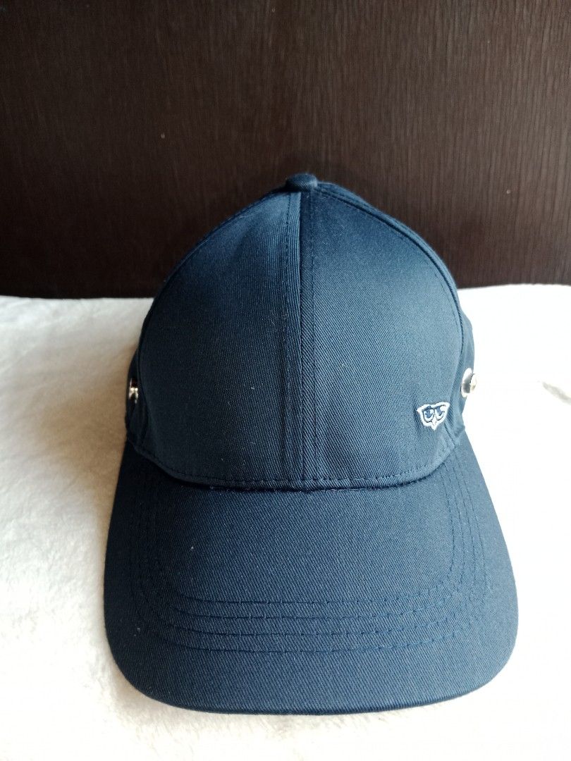 Dark Blue Cap with Metal Accents (Category: Caps & Hats) located in Manila. Submitted by angeloarce64172 (Listing ID 1440230896, Image 1). Description: - Dark blue baseball cap - Features cool metal details on the side and back - Adjustable strap for a perfect fit - Brand new with tags still attached - Ideal for casual outings or sports activities.