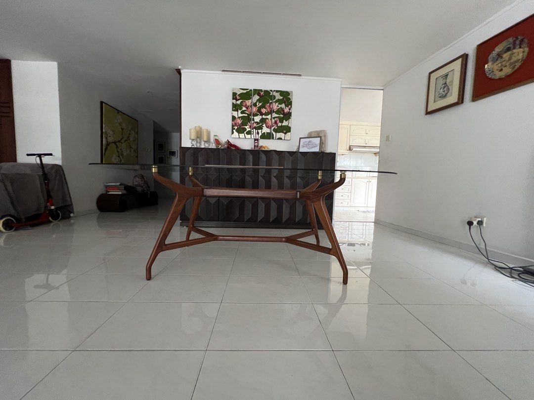 Dining Table (Category: Tables & Sets) located in Singapore. Submitted by swiftwind.ff46e2 (Listing ID 1440308780, Image 1). Description: Dining Table with glass top. Glass top comes off for easy transportation. 79” x 49” size. A smaller glass top of 60” x 42” also available. Bought at Tan Boon Liat for $1600. Selling for $600 OBO. Pickup between June 10 and June 13..