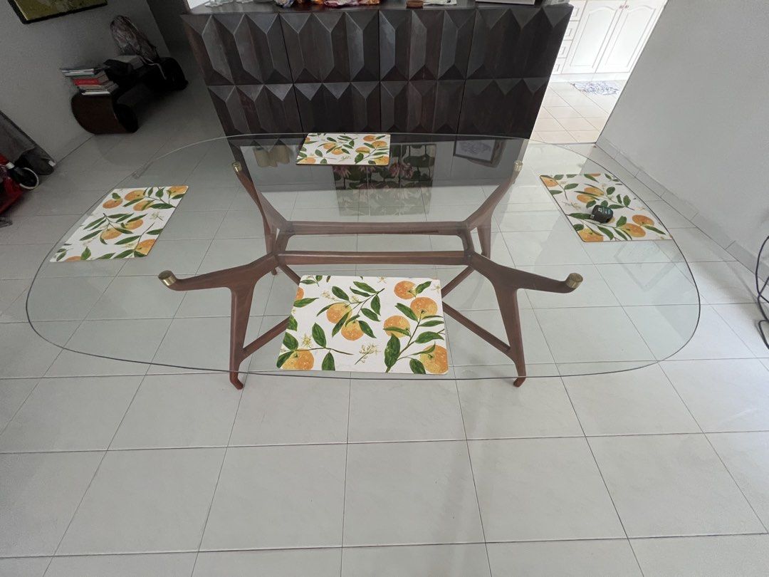 Dining Table (Category: Tables & Sets) located in Singapore. Submitted by swiftwind.ff46e2 (Listing ID 1440308780, Image 2). Description: Dining Table with glass top. Glass top comes off for easy transportation. 79” x 49” size. A smaller glass top of 60” x 42” also available. Bought at Tan Boon Liat for $1600. Selling for $600 OBO. Pickup between June 10 and June 13..