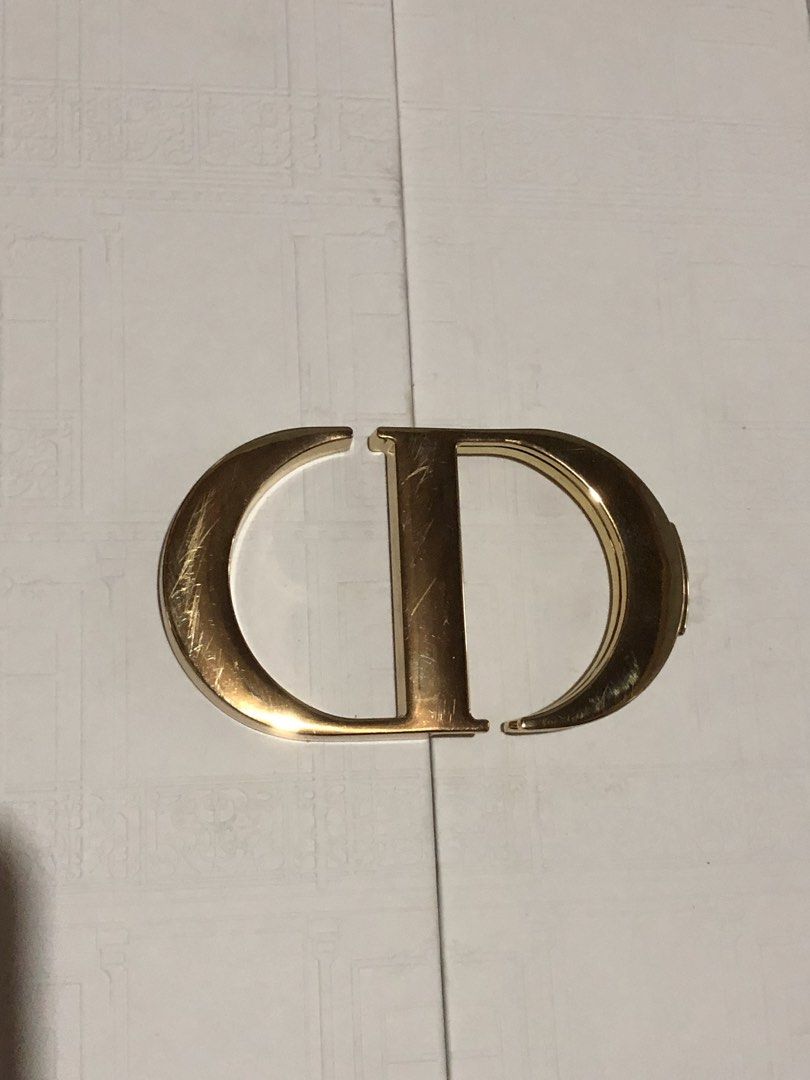 Dior CD Logo Advent Calendar Box (Category: Makeup) located in Montevista. Submitted by rdthriftshub (Listing ID 1440198863, Image 1). Description: - Authentic Dior Advent Calendar - Features a beautiful gold CD logo on the front - Elegant white design with intricate gold patterns - 25 numbered drawers for a daily festive countdown - Opens to reveal individual compartments.