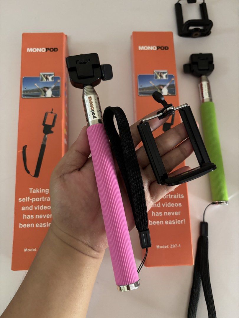 [TAKE ALL] 29 pcs. Extendable Selfie Sticks “Monopod” (Category: Camera Bags & Carriers) located in Cavite. Submitted by nanangonlineshop (Listing ID 1440231832, Image 2). Description: 📌 Extendable Selfie Sticks “Monopod” (brand new) 🏷️ P25 (each) 🏷️ P550 (take all) ✅ Available: 29 pcs. ✅ Colors: Pink & Yellow Green ✅ Extendable Design: The selfie sticks can extend up to approximately 110-115cm to capture wider shots. ✅ Material: They are cons