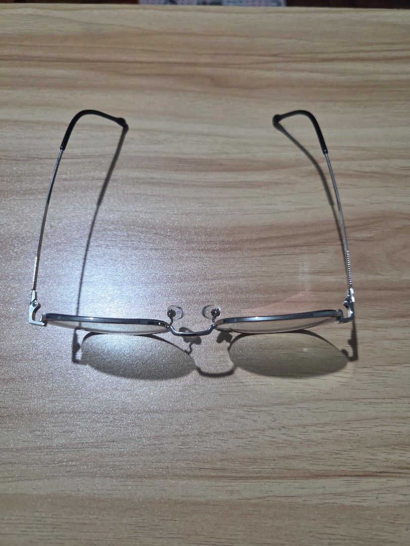 Eyeglasses with Case (Category: Sunglasses & Eyewear) located in Makati City. Submitted by realsnapshoppe (Listing ID 1440227312, Image 2). Description: - Grade 2.00 with Anti radiation and Transition(Photochromic lense) - Lens can be replaced - Silver-toned metal frame - Black temple tips - Clear lenses - Comes with a light blue protective case - Ideal for everyday wear.