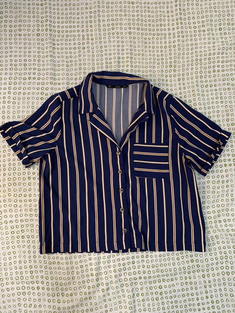 FREE SF I Forme Striped Button-Up Shirt (Category: Shirts) located in Iligan City. Submitted by prelovedbyspg (Listing ID 1440263701, Image 1). Description: - Navy blue shirt with white and brown stripes - boxy fit - Single chest pocket - Size M on tag but can fit up to semi-L.