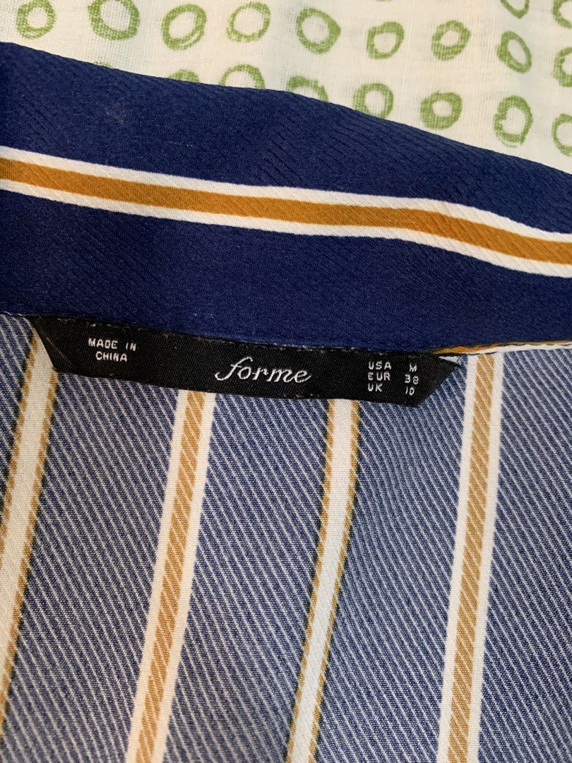 FREE SF I Forme Striped Button-Up Shirt (Category: Shirts) located in Iligan City. Submitted by prelovedbyspg (Listing ID 1440263701, Image 2). Description: - Navy blue shirt with white and brown stripes - boxy fit - Single chest pocket - Size M on tag but can fit up to semi-L.