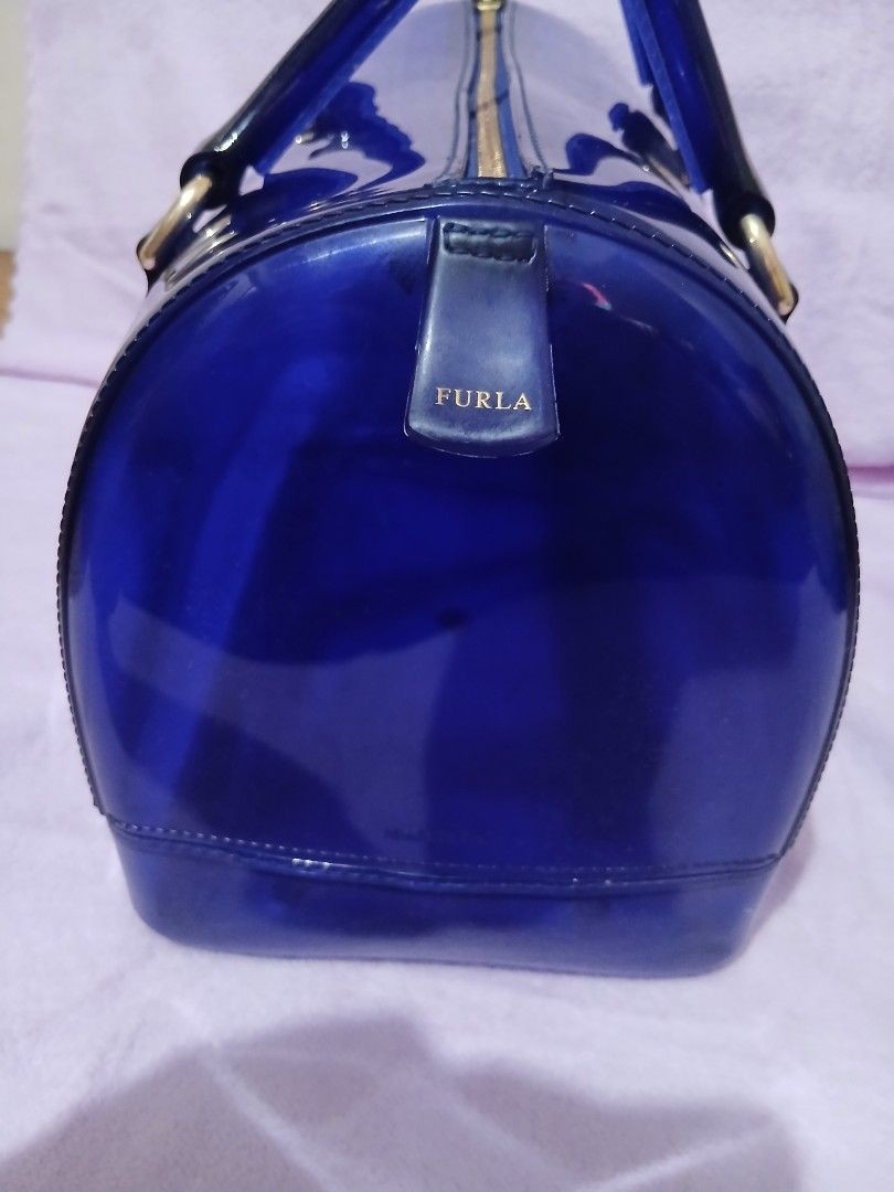 Furla Candy Satchel Handbag (Category: Luxury Bags & Wallets) located in Bocaue. Submitted by jennicakes.2.0 (Listing ID 1440260298, Image 3). Description: Furla Candy Satchel Handbag ✓ Blue transparent Furla Handbag ✓ Zipper closure ✓ Top handles ✓ Ideal for everyday use or a pop of color 💷Mode of Payment 💜 Maya 🩷 GoTyme 🤎GCash 📦 Mode of Delivery Standard - J&T Delivery Same Day - Lalamove.