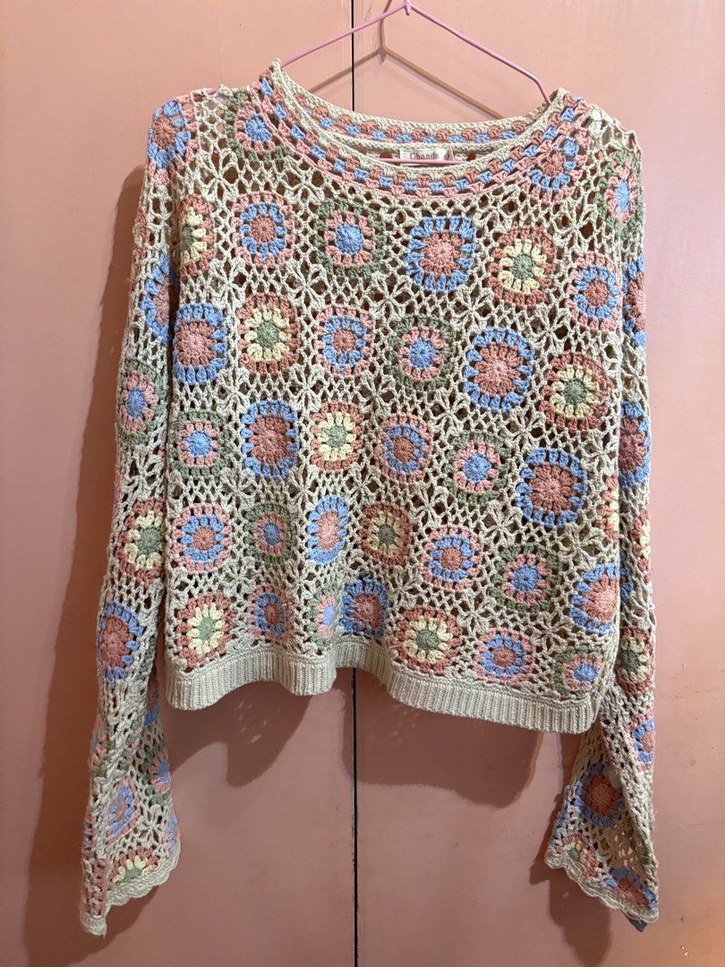 Ghanda Crochet Knit Sweater Size M (Category: Coats, Jackets and Outerwear) located in Bulacan. Submitted by smdjc (Listing ID 1440205504, Image 1). Description: - Unique crochet knit sweater with a vibrant granny square pattern. - Features a classic round neckline. - Stylish long bell sleeves. - Open and airy knit, ideal for layering over tops or dresses. - A unique and eye-catching addition to any wardrobe..