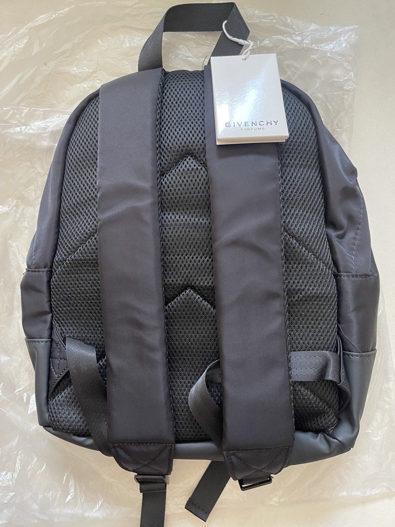Givenchy Parfums Nylon Backpack Grey (Category: Luxury Bags & Wallets) located in Quezon City. Submitted by kingcurator (Listing ID 1440272936, Image 2). Description: - Grey nylon backpack from Givenchy Parfums - Front pocket with zip closure - Includes original dust bag - Ideal for everyday use or travel.
