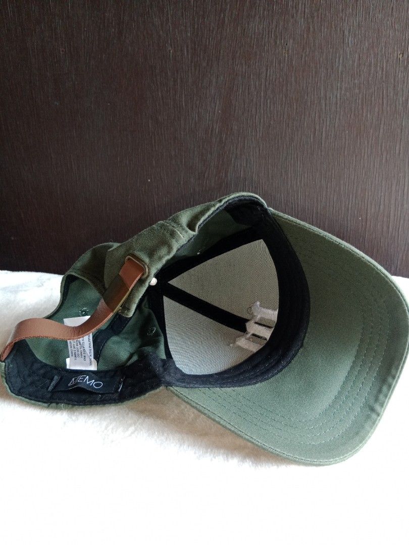Green Baseball Cap with 'm' Logo (Category: Caps & Hats) located in Manila. Submitted by angeloarce64172 (Listing ID 1440232376, Image 3). Description: - Stylish green baseball cap - Prominent white 'm' logo on the front - Classic baseball cap design with curved brim - Adjustable brown leather strap at the back for a comfortable fit - Perfect for casual wear and adding sporty flair.
