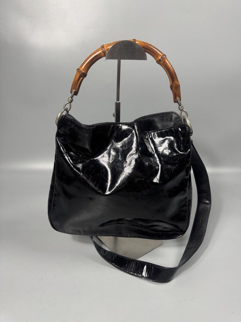 Gucci bambo handbag/crossbody (Category: Luxury Bags & Wallets) located in Quezon City. Submitted by streetgallerygarments (Listing ID 1440285725, Image 2). Description: vintage Gucci Bamboo Top Handle 2-Way Bag crafted in black patent leather / enamel finish, dating back to the late 1990s or early 2000s Tom Ford era.