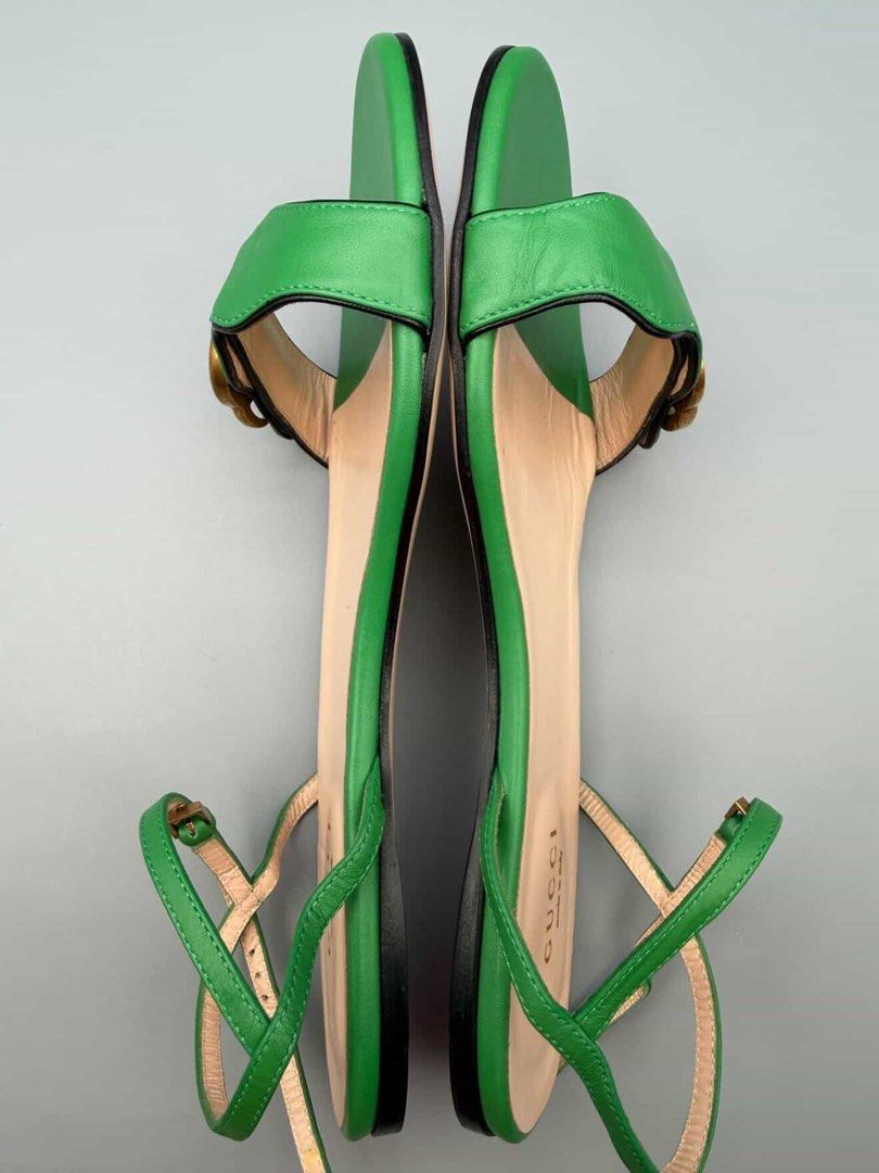 Gucci Green Leather Double G Sandals (Category: Flats & Sandals) located in Manila. Submitted by klowibaby (Listing ID 1440292543, Image 2). Description: - Authentic Gucci sandals in vibrant green - Features iconic Double G hardware - Genuine leather upper and sole - Secure ankle strap closure - Made in Italy - Size: 37.5 - Versatile for any outfit.