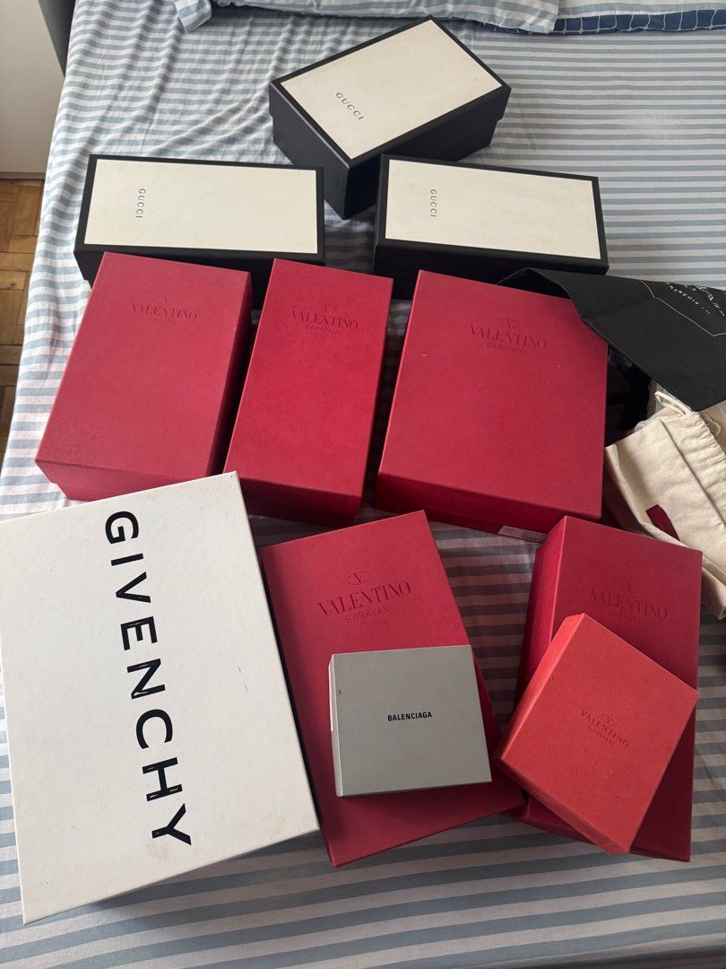 Gucci, Valentino, Givenchy, Balenciaga Designer Boxes (Category: Luxury Accessories) located in Quezon City. Submitted by annsapp (Listing ID 1440259741, Image 1). Description: - Bundle of luxury designer boxes - Includes brands: Gucci, Valentino, Givenchy, Balenciaga - Ideal for storing small items or as premium gift packaging - Available in assorted colors: red, white, and black - All boxes are official and branded.