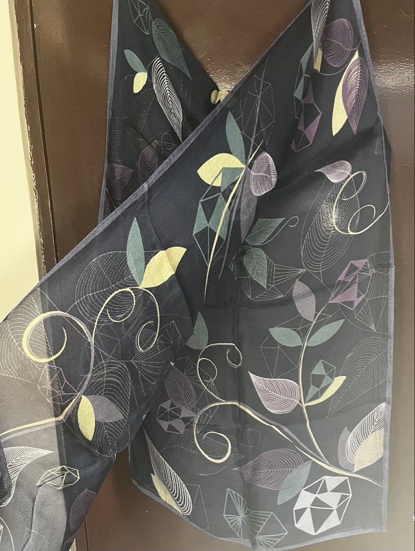 Guy Laroche Paris Scarf - Blue Geometric Leaf Print (Category: Scarves) located in Cebu City. Submitted by 7paws (Listing ID 1440377324, Image 3). Description: - Authentic Guy Laroche Paris scarf - Base color: Dark blue - Print: Geometric leaf and vine pattern - Colors: Purple, green, and yellow - Fabric: Lightweight with a beautiful drape - Versatile accessory to elevate any outfit.