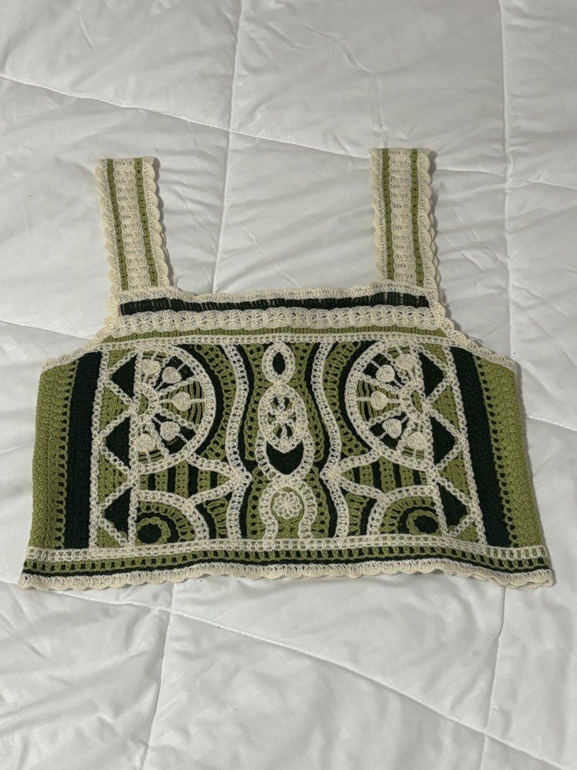 Handmade Crochet Crop Top Green Cream (Category: Sleeveless) located in Apalit. Submitted by carmelaregulto (Listing ID 1440320285, Image 1). Description: - Super cute handmade crochet crop top - Intricate green and cream patterns - Adjustable straps for a perfect fit - Unique, one-of-a-kind design - Ideal for festivals or casual summer wear.