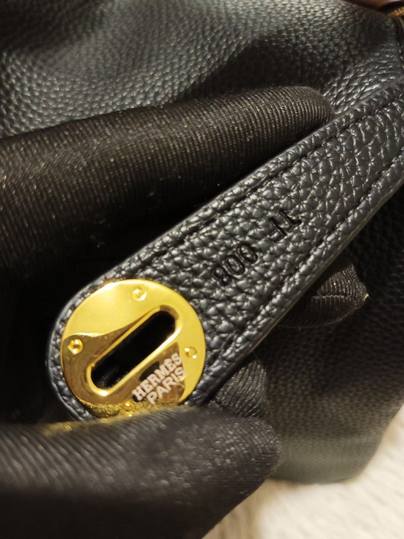 Hermes Black Leather Taurillon Clemence Lindy Bag (Category: Luxury Bags & Wallets) located in Digos. Submitted by chihanu (Listing ID 1440335913, Image 2). Description: - Genuine black Taurillon Clemence leather - Elegant gold hardware - Front flap closure with secure turn-lock - Versatile carrying options: two top handles and a detachable shoulder strap - Organized interior with multiple compartments - Pristine condition, clean inside and out -