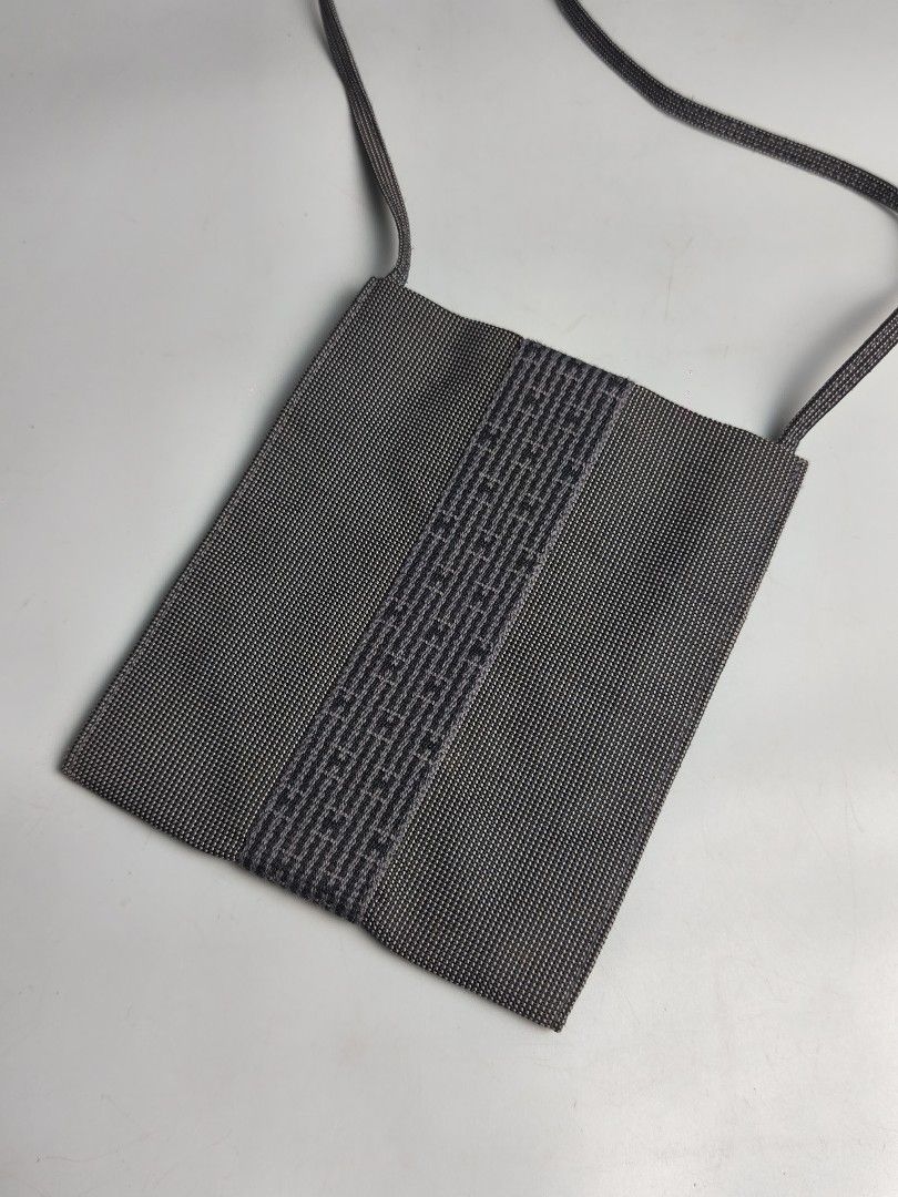 Hermes Herline Pochette Grey Canvas Sling Bag (Category: Luxury Bags & Wallets) located in Bulacan. Submitted by 4kcollection.ph (Listing ID 1440217230, Image 2). Description: Hermes Herline Pochette Grey Canvas Sling Bag Pre-loved from Japan 🇯🇵 Rank A (Excellent Condition) Size: Small Pwede pang gift 🎁 No issue Dm for sure buyer 📩 MOP: Gcash / Maya / BPI Courier: J&t / Lbc / Lalamove Location: SJDM Bulacan.