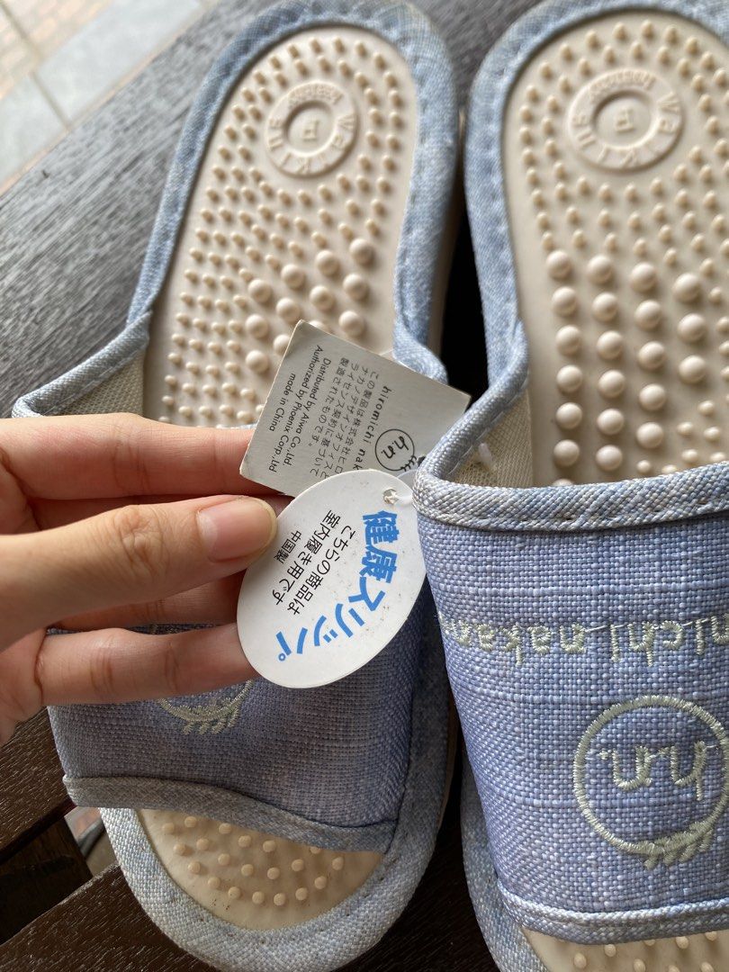 Hiromichi Nakano Massage Slippers (Category: Slippers and slides) located in Quezon City. Submitted by addy_addy (Listing ID 1440326599, Image 2). Description: - Light blue Hiromichi Nakano slippers - Features massage nubs on the sole for ultimate relaxation - 'hn' logo and 'hiromichi nakano' text clearly visible - Zig-zag pattern on the sole for enhanced grip - Perfect for lounging at home - Comes with original tags, brand new.