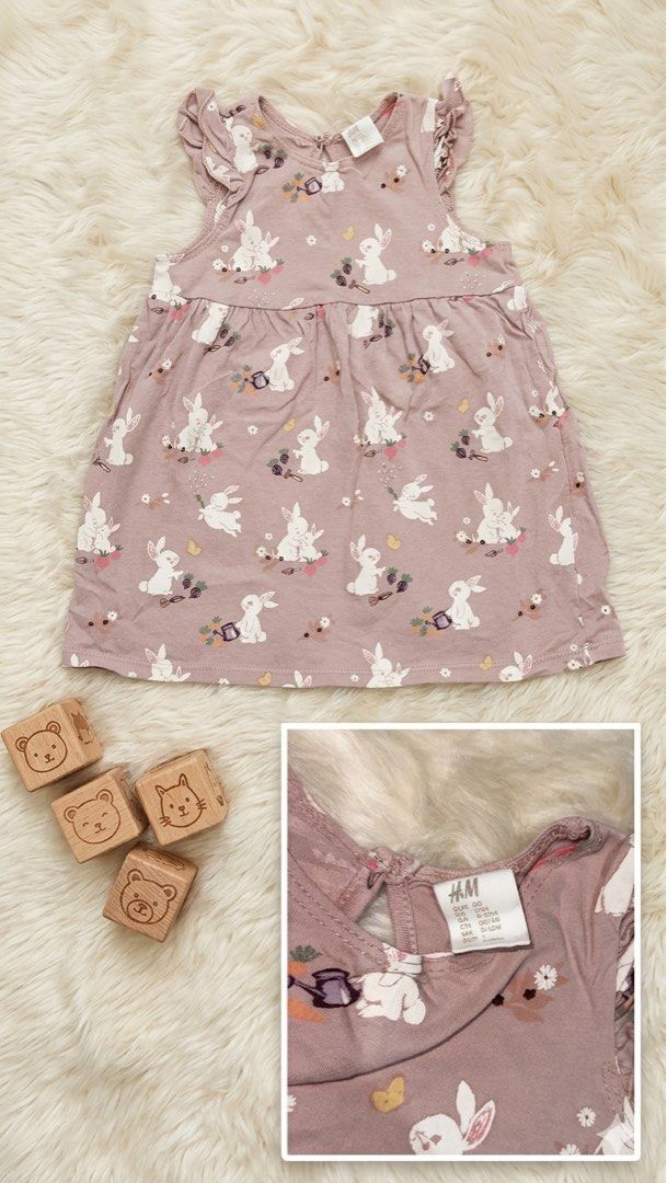H&M Baby Girl Bunny Print Dress with Ruffle Sleeves (Category: Babies & Kids Fashion) located in Rizal. Submitted by cutiefindspreloveditems (Listing ID 1440368049, Image 1). Description: - Adorable H&M baby dress - Features a sweet all-over bunny print - Lovely dusty rose color - Cute ruffle sleeves - Convenient tie closure at the back - Made from soft, comfortable cotton - Ideal for spring occasions or Easter celebrations.