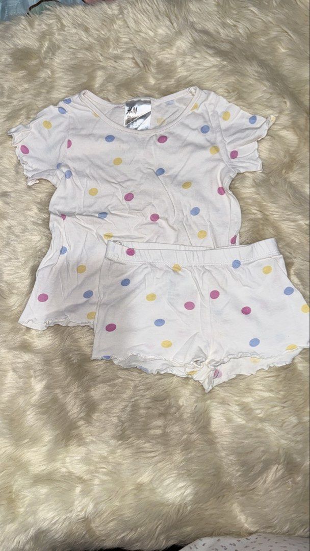 H&M Baby Girls Polka Dot Pajama Set Size 2T (Category: Babies & Kids Fashion) located in Rizal. Submitted by cutiefindspreloveditems (Listing ID 1440367854, Image 2). Description: - Adorable H&M pajama set for kids - White with fun, colorful polka dots - Includes short-sleeved top and matching shorts - Ideal for warmer nights - Size: 2T.
