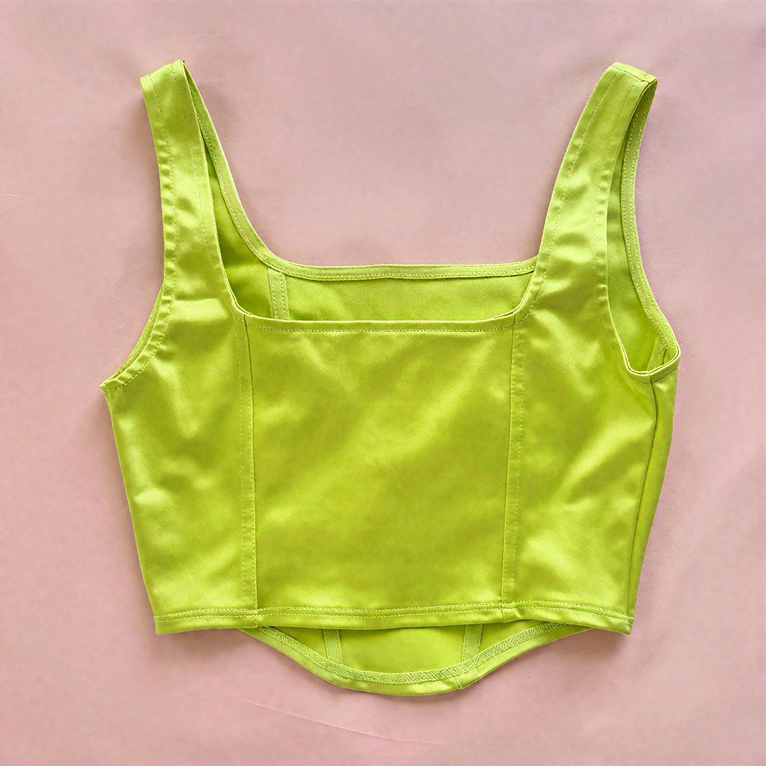 H&M green satin corset party top (Category: Sleeveless) located in Las Pinas. Submitted by anyascloset_ (Listing ID 1440291287, Image 2). Description: doesn’t fit me sadly☹️ perfect condition no flaws price is negotiable if bought with other items🫶.