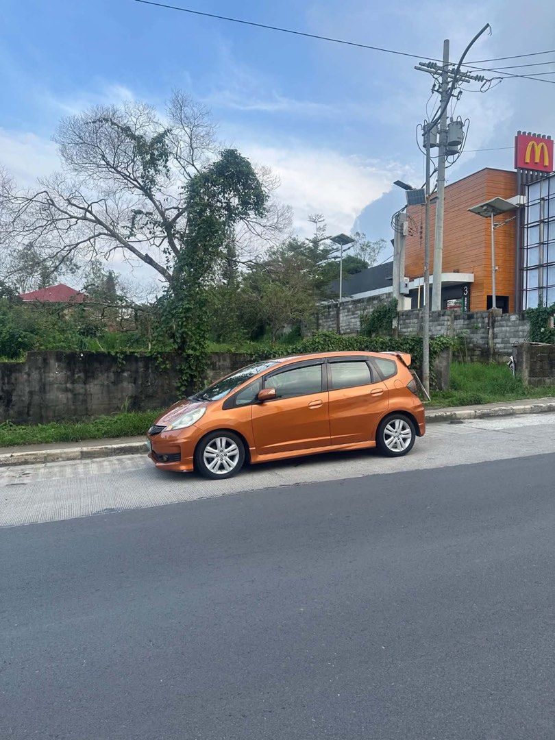 Honda Jazz 1.5 GE MMC Auto (Category: Used Cars) located in Bacoor. Submitted by seeteee (Listing ID 1440277191, Image 3). Description: FOR SALE: 2012 Honda Jazz GE 1.5 MMC Top of the line super fresh *Paddle Shifter *Smooth shifting *Cold Ac *10” Android HU *Orig Honda Leather seats cover *5D Floor Mattings *98% tires *Newly replaced battery *Updated Registration *Nano Ceramic Clear Tint *Odo 8x,xxxx legit not tampered *Not flooded *Ending Plate