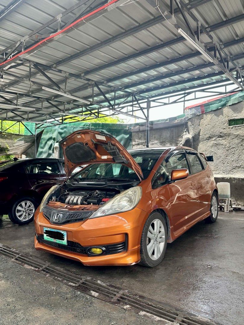 Honda Jazz 1.5 GE MMC Auto (Category: Used Cars) located in Bacoor. Submitted by seeteee (Listing ID 1440277191, Image 2). Description: FOR SALE: 2012 Honda Jazz GE 1.5 MMC Top of the line super fresh *Paddle Shifter *Smooth shifting *Cold Ac *10” Android HU *Orig Honda Leather seats cover *5D Floor Mattings *98% tires *Newly replaced battery *Updated Registration *Nano Ceramic Clear Tint *Odo 8x,xxxx legit not tampered *Not flooded *Ending Plate