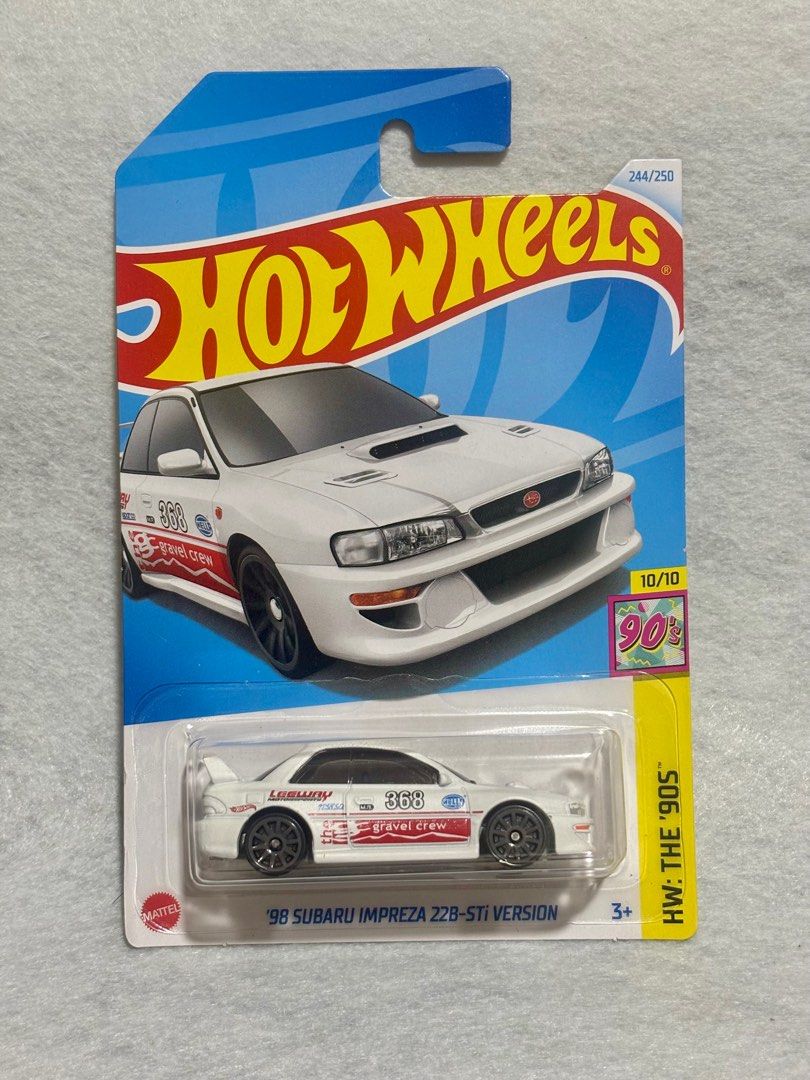 Hot Wheels '98 Subaru Impreza 22B-STI Version 244/250 (Category: Vehicle & Diecast Models) located in Manila. Submitted by bilhinmoko_online (Listing ID 1440280314, Image 1). Description: - Hot Wheels '98 Subaru Impreza 22B-STI Version - Part of the HW: The '90s series - Card #244 out of 250 - Color: White with red and black racing decals - Comes in original packaging 📍 Location: Mandaluyong / Ortigas Center, Pasig ⸻ 💰 Modes of Payment: ✅ GCash