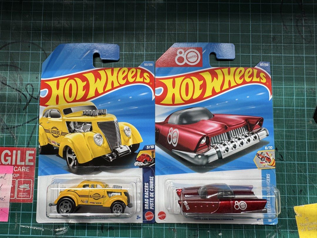 Hot Wheels - Lot (Category: Toys & Games) located in Singapore. Submitted by sleekwheels (Listing ID 1440251160, Image 1). Description: - Take all for $3 - From the 80th Anniversary Collection - Part of the Drag Racers series - Perfect for collectors or for playtime.