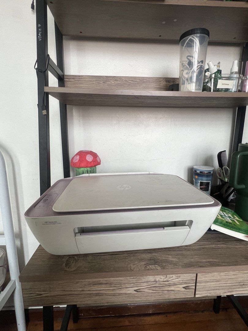 HP All-in-One Printer Scanner (Category: Printers, Scanners & Copiers) located in Quezon City. Submitted by nikishanicolas (Listing ID 1440280309, Image 2). Description: HP DeskJet Ink Advantage 2335 *️⃣ Functions: Print and Scan *️⃣ 3-in-1: printing, scanning (scan document into digital copies), & photocopying *️⃣ Color: Light Purple and White *️⃣ Condition: Good working condition with minor dust and scuffs from normal use - 9/10 *️⃣ Rarely used