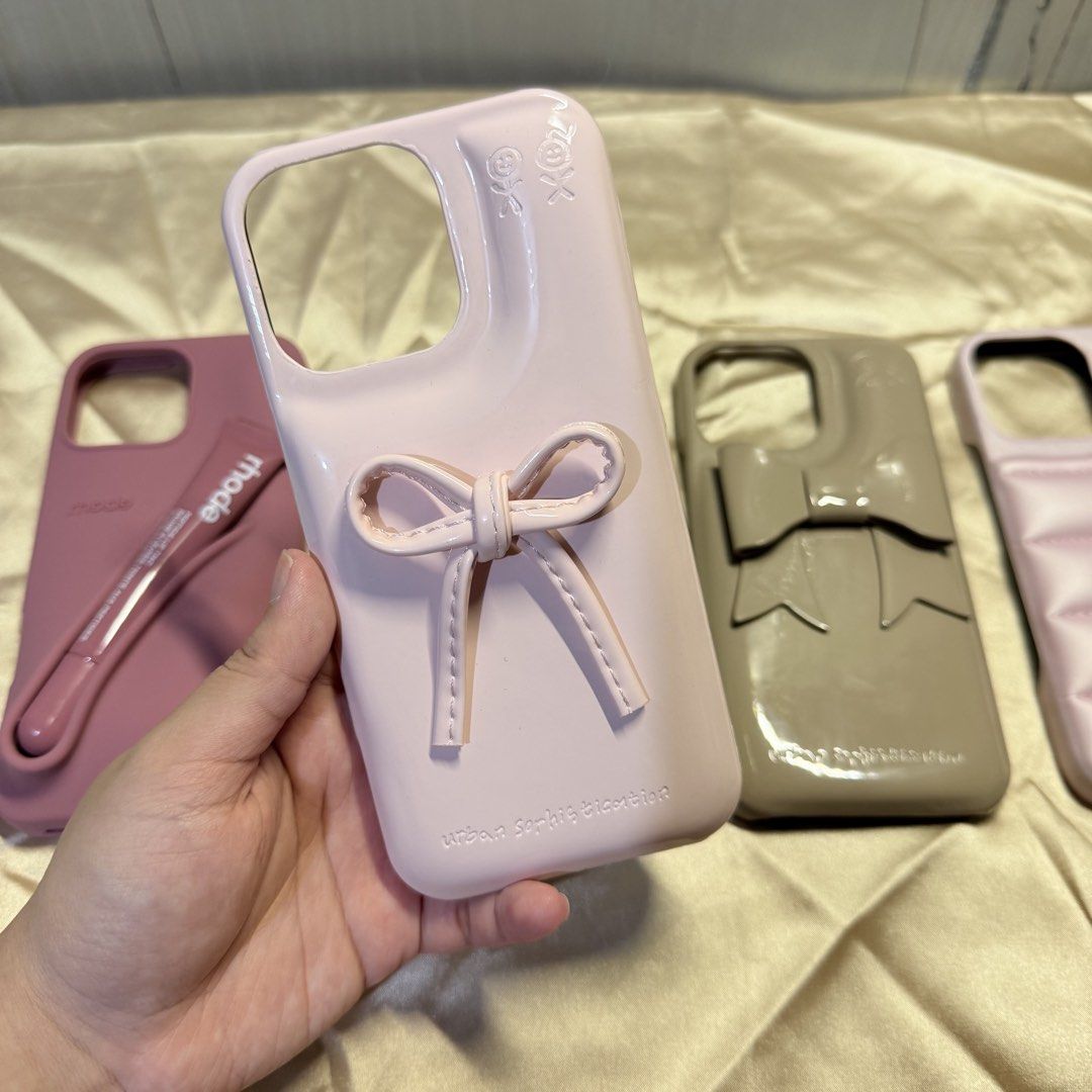 Iphone 16 Pro Max Pastel Nude Cases TAKE ALL (Category: Cases & Sleeves) located in Tarlac. Submitted by milkshakeee_ (Listing ID 1440371124, Image 3). Description: - Rhode Case with box & liptint - Cute Pastel Pink Puffer Case - Nude Ribbon Puffer Case - Pink Puffer Case.