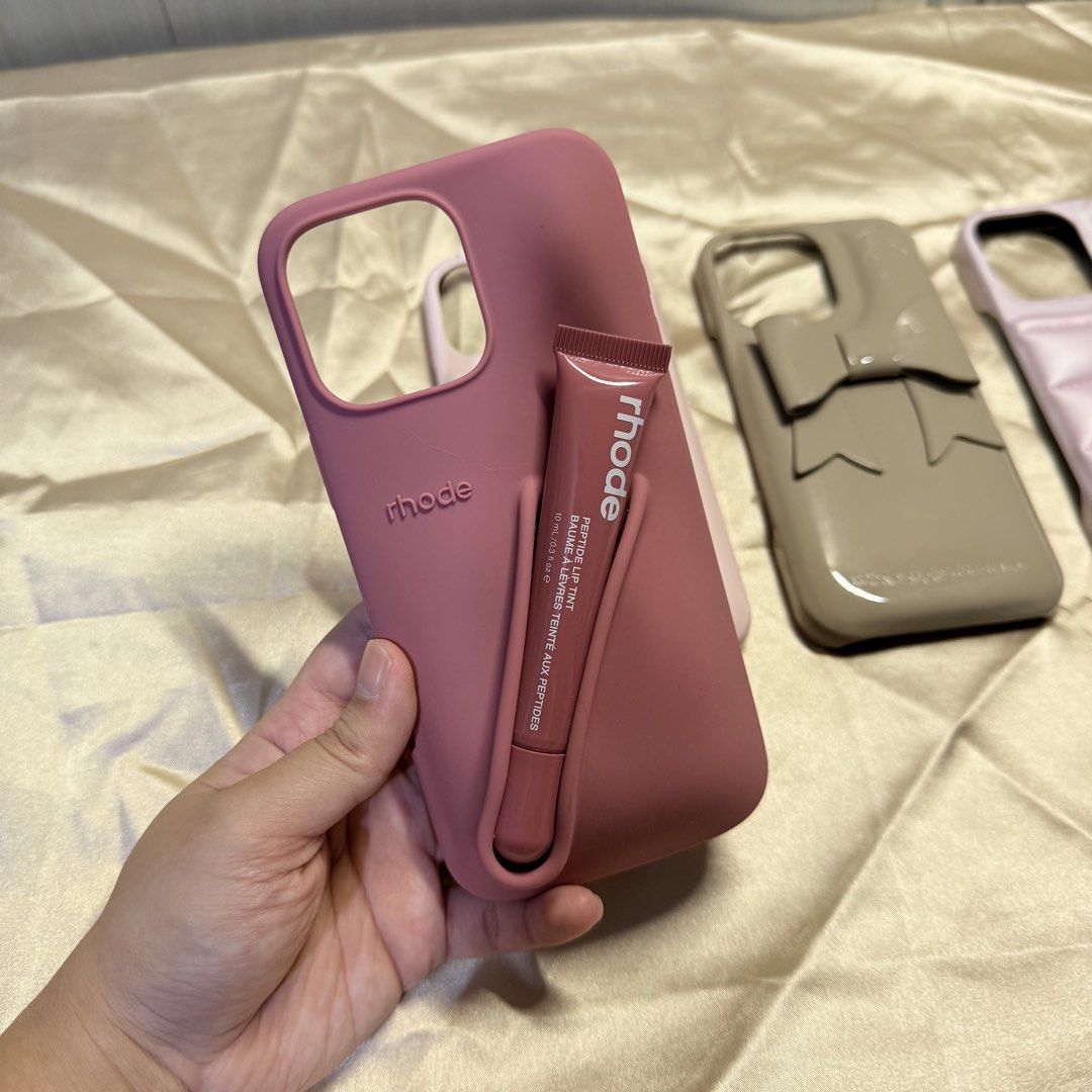 Iphone 16 Pro Max Pastel Nude Cases TAKE ALL (Category: Cases & Sleeves) located in Tarlac. Submitted by milkshakeee_ (Listing ID 1440371124, Image 2). Description: - Rhode Case with box & liptint - Cute Pastel Pink Puffer Case - Nude Ribbon Puffer Case - Pink Puffer Case.