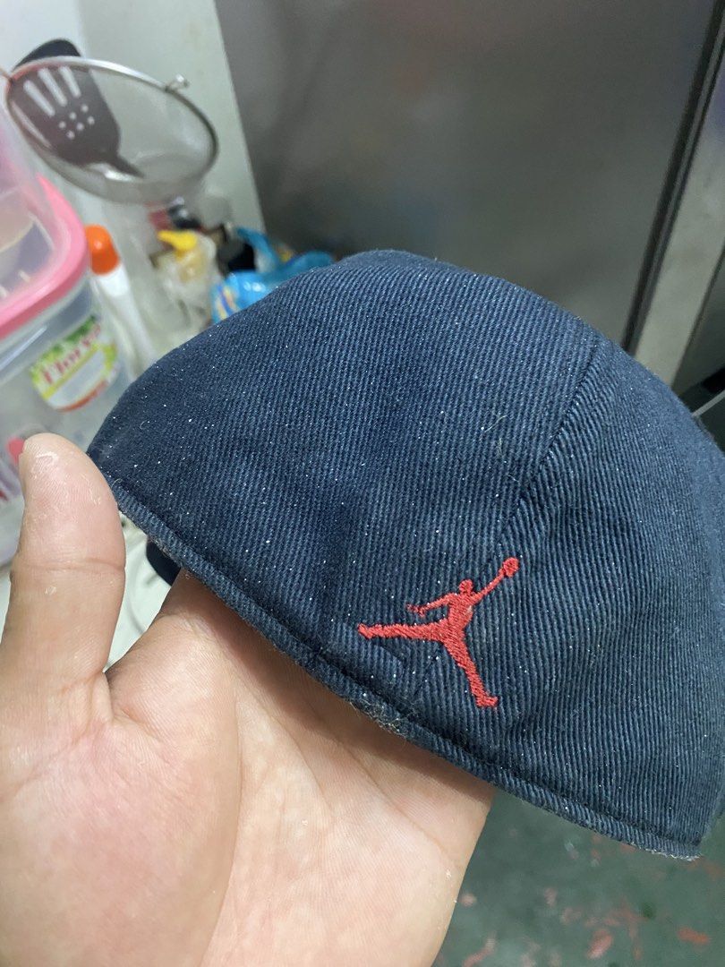 Jordan Cap Red Jumpman Logo Navy Blue (Category: Caps & Hats) located in Manila. Submitted by mindthrift.12 (Listing ID 1440384140, Image 2). Description: - Navy blue Jordan cap - Iconic red Jumpman logo on the front - Smaller red Jumpman embroidered on the side - Tag inside indicates size 7 - Perfect for any Jordan enthusiast.