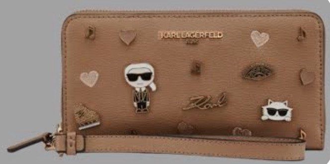 Karl Lagerfeld Zip Around Wallet with Charms (Category: Wallets & Card holders) located in Cavite. Submitted by ahpolm (Listing ID 1440376099, Image 3). Description: - Authentic Karl Lagerfeld zip-around wallet - Adorable charms: Karl Lagerfeld figure, cat, hearts, musical notes - Secure zip-around closure - Ample interior space with numerous card slots and compartments - Detachable wrist strap included - Ideal for keeping your essentials organiz