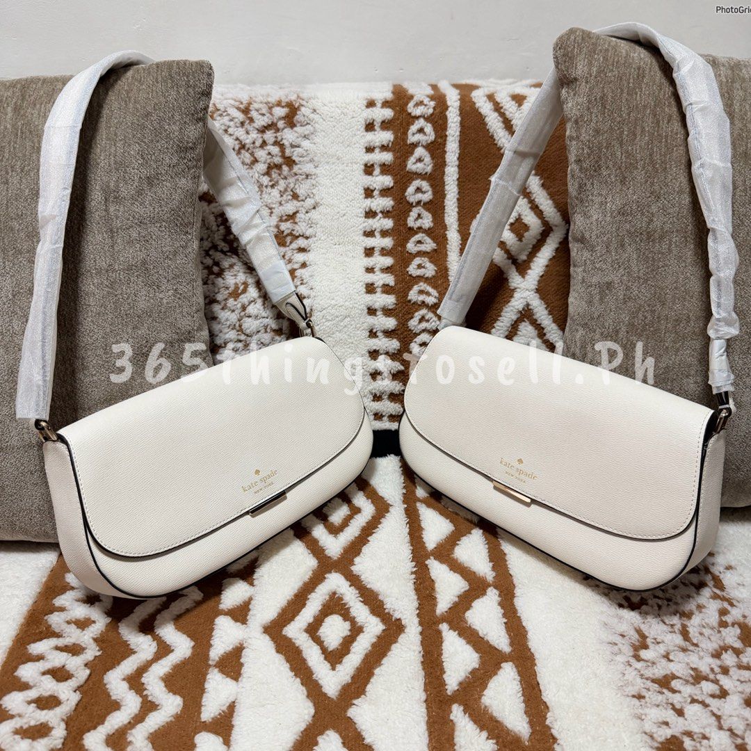 Kate Spade White Pebble Leather Shoulder Bag (Category: Shoulder Bags) located in Masantol. Submitted by 365thingstosell.ph (Listing ID 1440289634, Image 2). Description: Soooo prettyy!! 😍🥰 Avaiable now!!!! @365thingstosell.ph YES ORIGINAL 💯🫶🏻 Kasya ang long wallet mga sis Brandnew with carecard 4,800 + sf Super lightweight nya lang - Brand: Kate Spade - Material: White pebble leather - Closure: Flap with gold accent - Strap: Adjustable - In