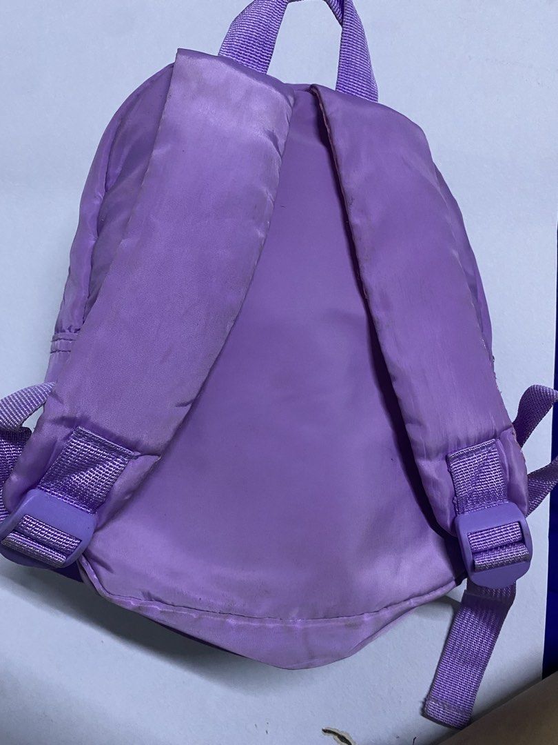 Kids Purple Unicorn Plush Backpack (Category: Backpacks) located in Caloocan City. Submitted by mamamo.to (Listing ID 1440380025, Image 2). Description: - Adorable purple backpack with a cute plush unicorn attached. - Main compartment with zipper closure. - Adjustable shoulder straps for a comfortable fit. - Perfect for toddlers and preschoolers. - Still in good, usable condition with plenty of adventures left ‼️NEED WASH Original price 380.
