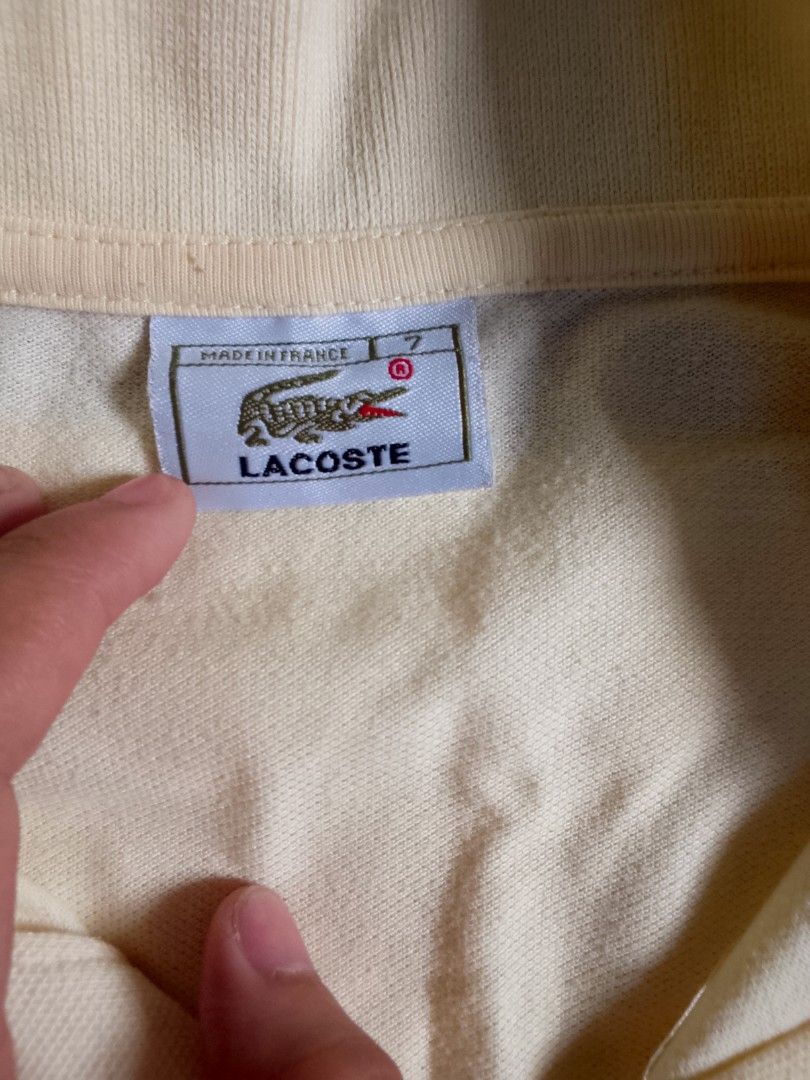Lacoste Polo Shirt - Yellow - Size 7 (Category: Tshirts & Polo Shirts ) located in Manila. Submitted by 1111111ccas (Listing ID 1440241438, Image 1). Description: - Yellow Lacoste Polo Shirt - Made in France - Classic crocodile logo on chest - Button collar - Size 7 - Ideal for casual wear.