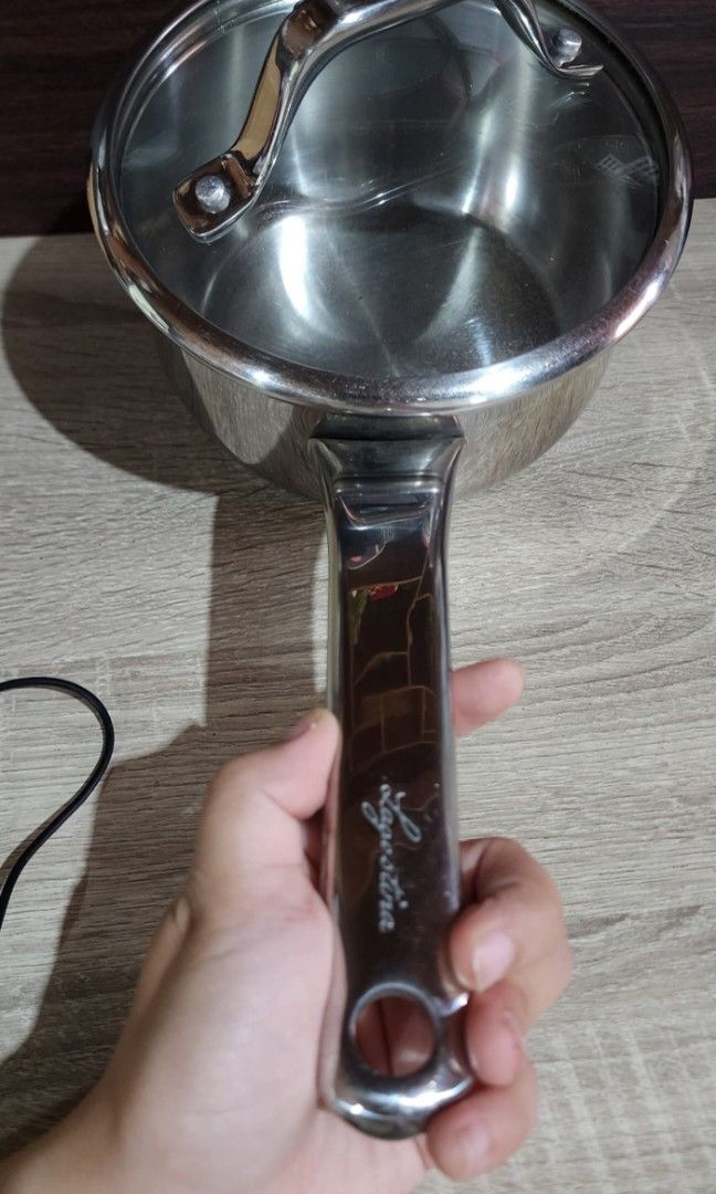 LAGOSTINA Heavy Duty Saucepan (Category: Cookware & Accessories) located in Baguio. Submitted by coffeesilvershadow_28 (Listing ID 1440378513, Image 2). Description: - From HK box - May takip na sya - Size: Approx. 17cmx9cm - Makapal at mabigat sya - With SOU, still in good condition- linis lng need - Baguio dropping - Jnt shipping- Payment first plus sf before shipping.