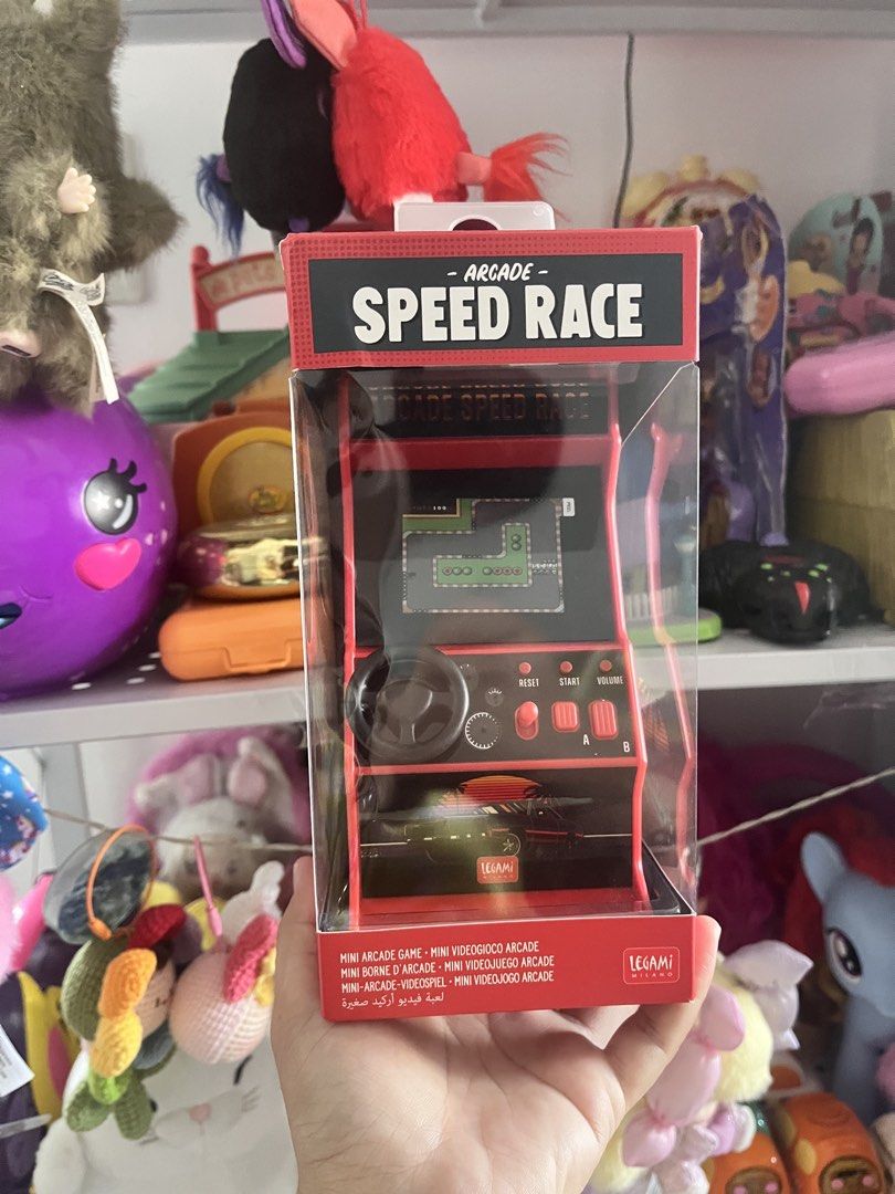 Legami Speed Race Mini Arcade Game with 30 Classic Games (Category: Kids Toys) located in Calamba. Submitted by thepinkpicksee (Listing ID 1440200217, Image 1). Description: - Relive classic racing fun with the Legami Speed Race Mini Arcade Game. - Features a 2.4" TFT screen for a clear display. - Includes a realistic steering wheel and joystick for immersive gameplay. - Enjoy 30 built-in classic racing games (motorbike, car, boat, airplane). - P