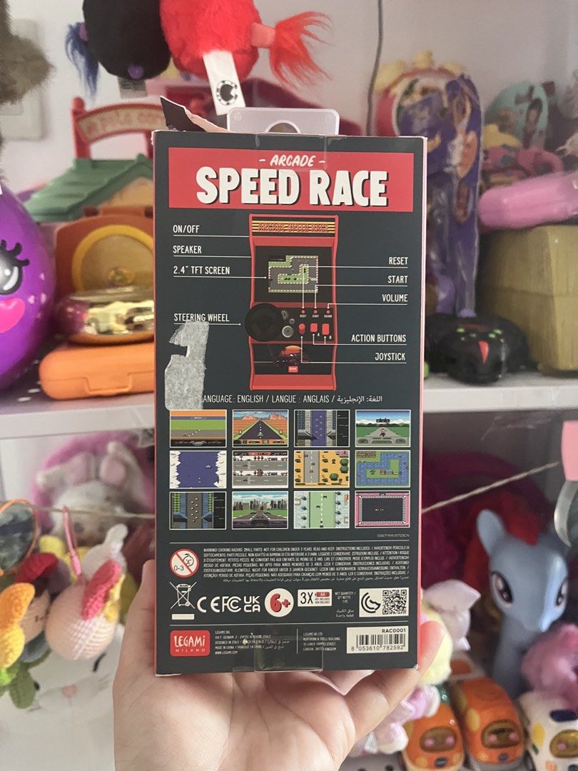 Legami Speed Race Mini Arcade Game with 30 Classic Games (Category: Kids Toys) located in Calamba. Submitted by thepinkpicksee (Listing ID 1440200217, Image 3). Description: - Relive classic racing fun with the Legami Speed Race Mini Arcade Game. - Features a 2.4" TFT screen for a clear display. - Includes a realistic steering wheel and joystick for immersive gameplay. - Enjoy 30 built-in classic racing games (motorbike, car, boat, airplane). - P