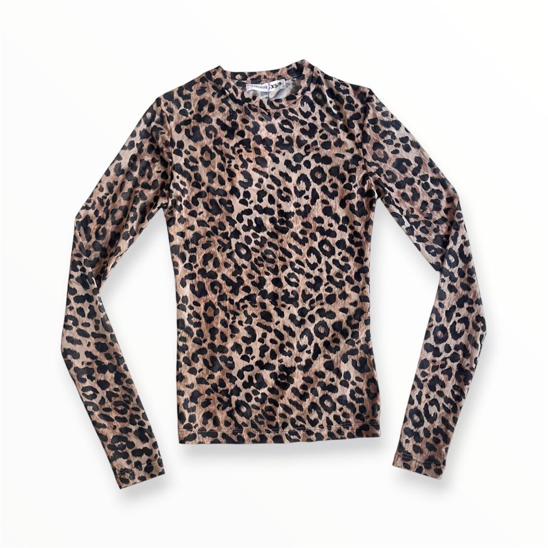 Animal Print Long Sleeve Mesh Top (Category: Longsleeves) located in Manila. Submitted by sanghaya.mnl (Listing ID 1440311261, Image 2). Description: -BRANDNEW - Leopard Print Mesh Top - Long Sleeves - Size: XS/S - Versatile: Wear alone or layer - Ideal for night outs or casual wear.