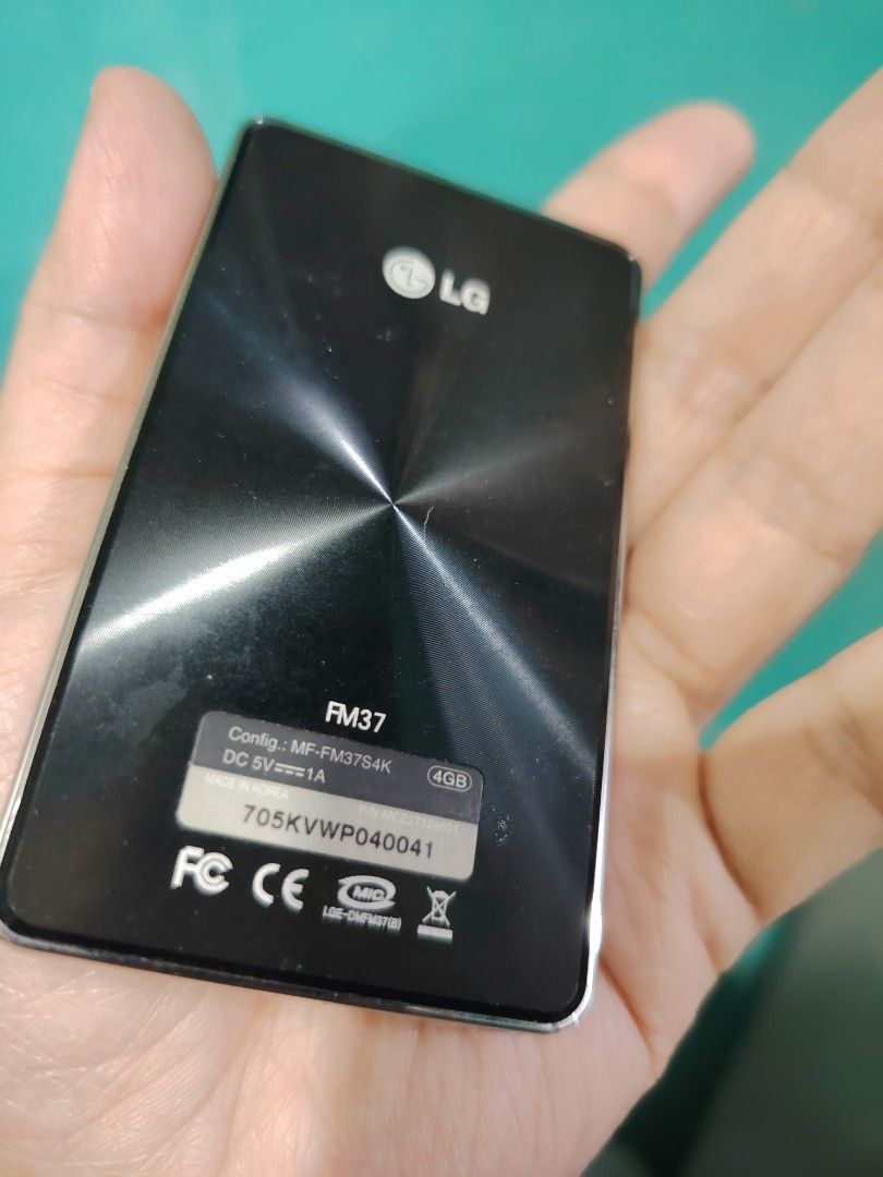 LG FM37 4GB MP3 Player untested (Category: Portable Music Players) located in Manila. Submitted by lfg92 (Listing ID 1440319009, Image 2). Description: - Black LG MP3 Player - 4GB Storage - Model: FM37 - Screen has light scratches - Brushed metal back finish - Ideal for portable music listening.