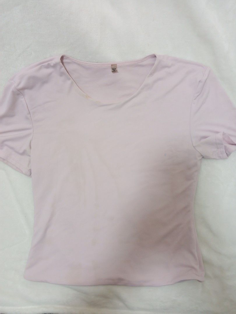 Light Pink V-Neck T-Shirt (Category: Shirts) located in Manila. Submitted by aly_chy (Listing ID 1440350343, Image 1). Description: - Basic light pink t-shirt - V-neck style - Short sleeves - Soft and comfortable fabric - Ideal for everyday wear - Great for layering or wearing on its own - Simple and versatile design - Please note: Some visible stains.