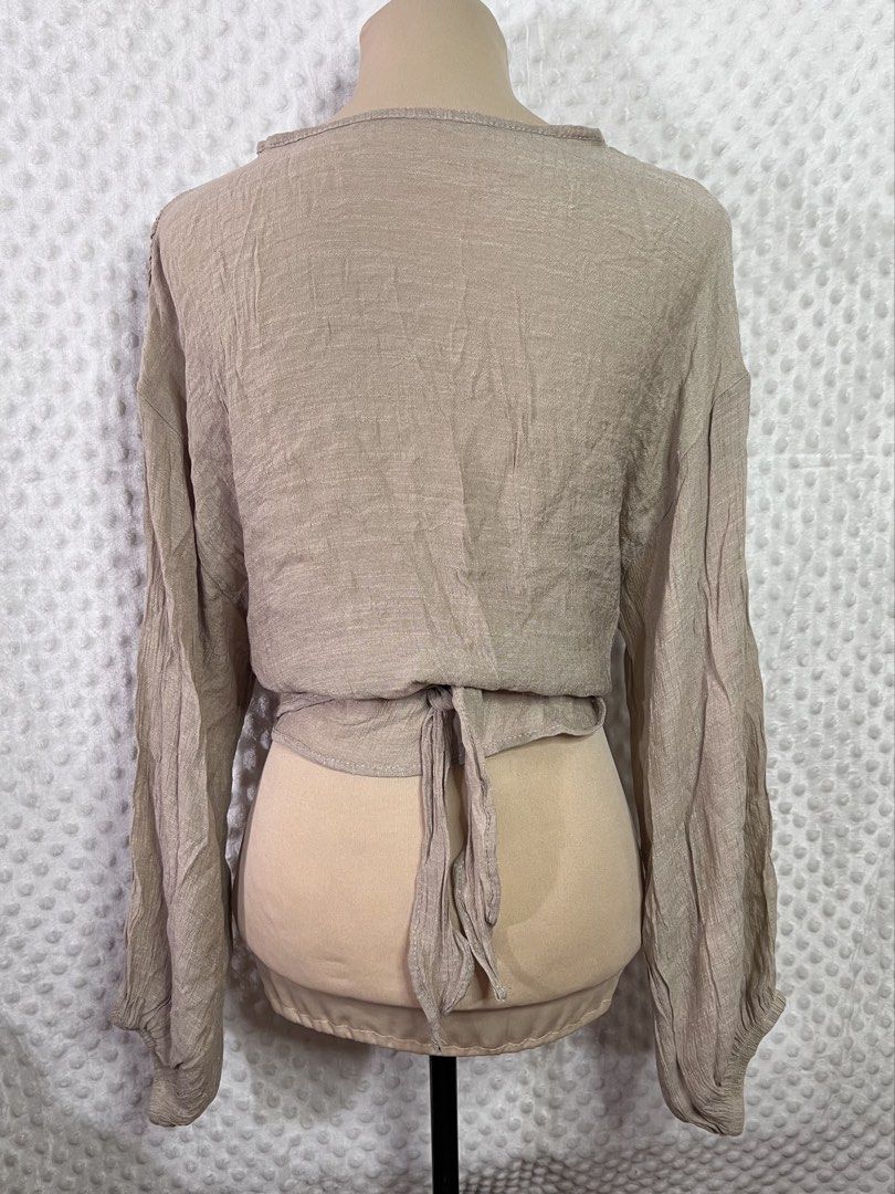 Lightweight Beige Linen Blend Wrap Top Long Sleeve (Category: Blouses) located in Quezon City. Submitted by mondaymayhem (Listing ID 1440347211, Image 2). Description: 596) fits xs-large 🚚j&t(payment first) ☑️same day delivery(lalamove/grab) 📍Batasan hills qc 📱message fbpage: Monday Mayhem .