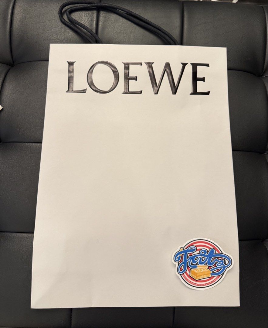LOEWE Paper Bag size: Medium ( 16.5 height x 12 widht ) (Category: Accessory Holder, Box & Organizers) located in Pasay City. Submitted by fritz_kickz_2012 (Listing ID 1440240461, Image 1). Description: LOEWE Paper Bag size: Medium ( 16.5 height x 12 widht ).